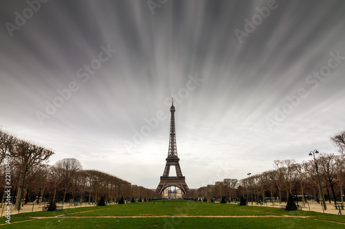 Beautiful tranquil long exposure view of the Eiffel tower in Paris, France, in black and white