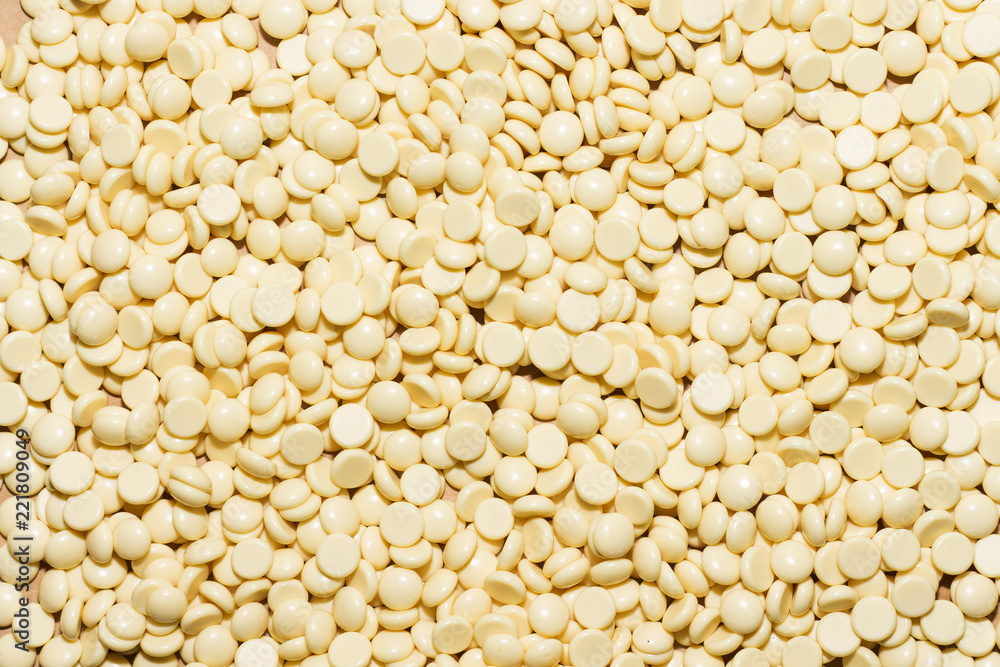 depilatory pearly yellow  solid wax beans  background