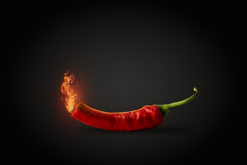 Papier peint photo Piments forts Piment rouge crachant des flammes  © Alex