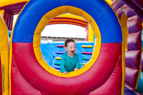 Funny toddler laugh on trampoline