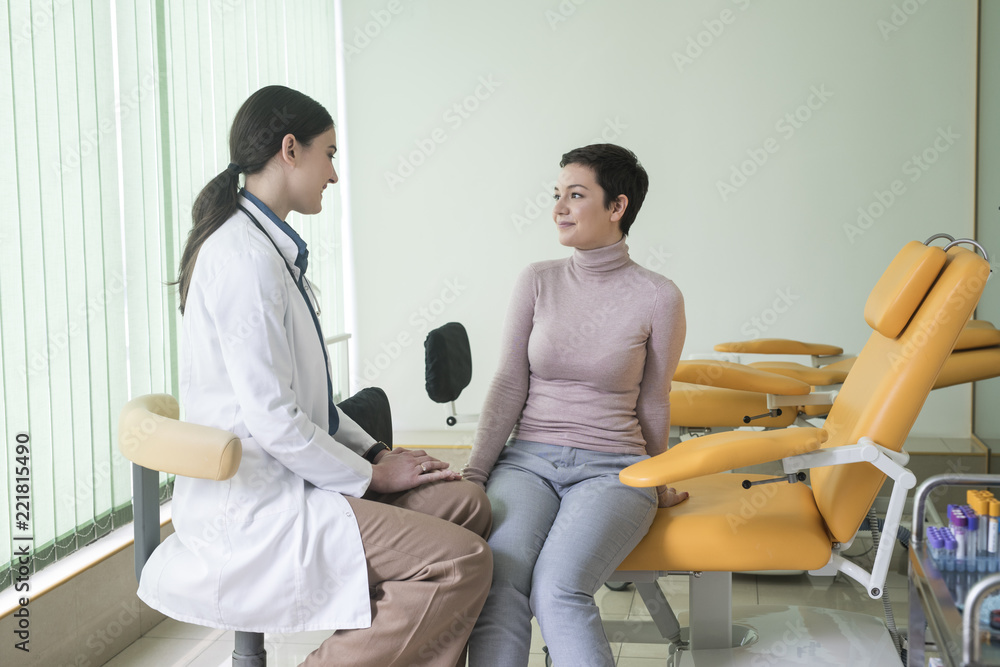 © LStockStudio - A Woman Physician Talking With Her Patient