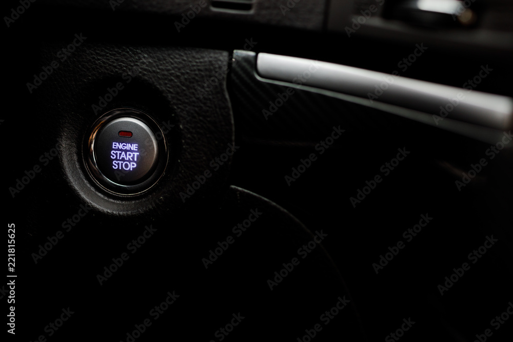 Detail on the start button in a car. Car interior, key, start&st
