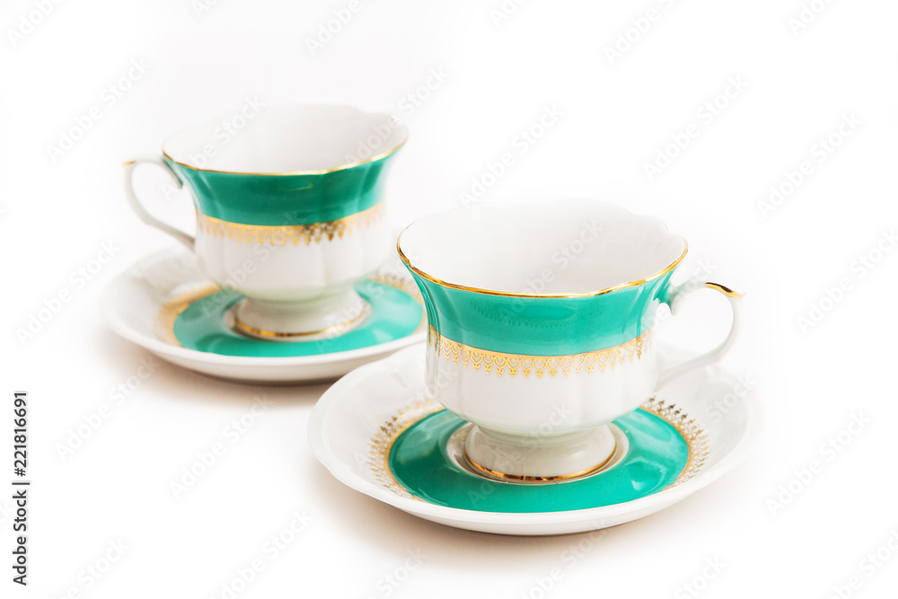 Fototapeta premium set of dishes on white background. Green indian cups