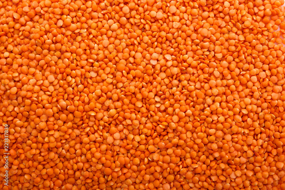 raw lentils on a white acrylic background