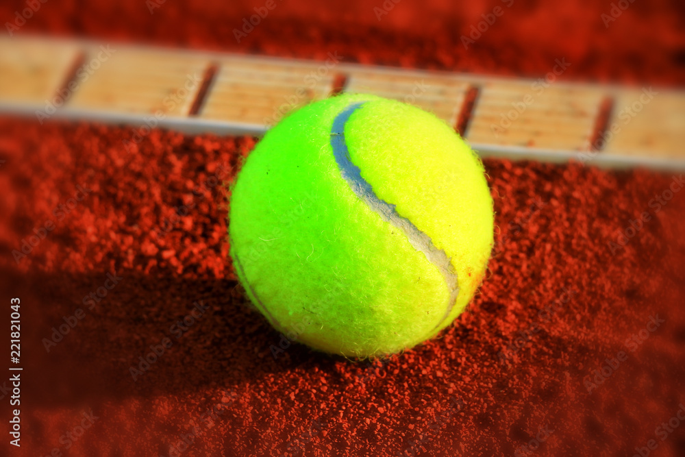 ennis balls on a tennis clay court