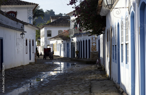 Reflections in the typical stone streets of Paraty