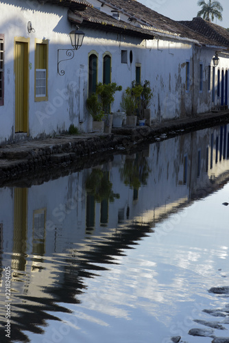 Reflections in the typical stone streets of Paraty