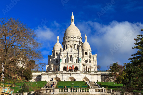 Beautiful view of the Basilica Sacre-Coeur in Paris, France, with a blue sky 