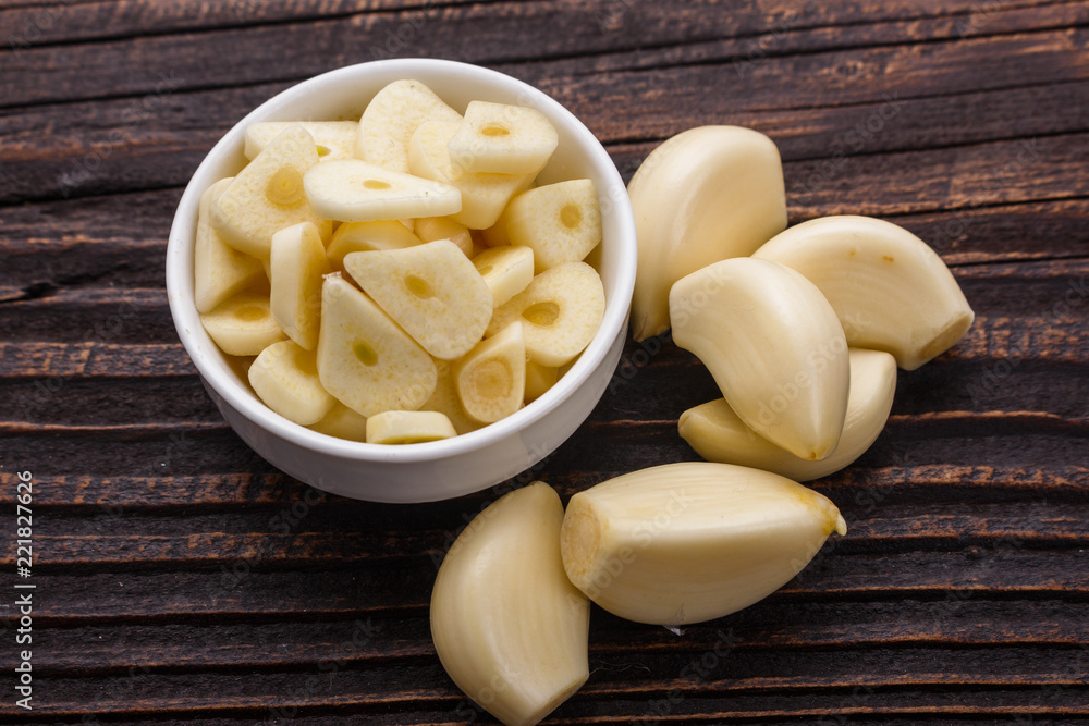 fragrant garlic on a wooden rustic background fragrant garlic on a wooden rustic background