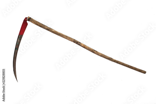 rusted metal scythe isolated on a white background photo