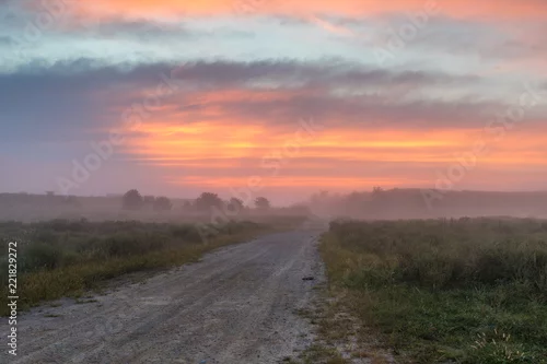 Fototapeta Dirt Road at Sunrise