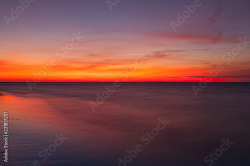 Dramatic sunset on the beach, Cape Cod, USA © Radomir Rezny