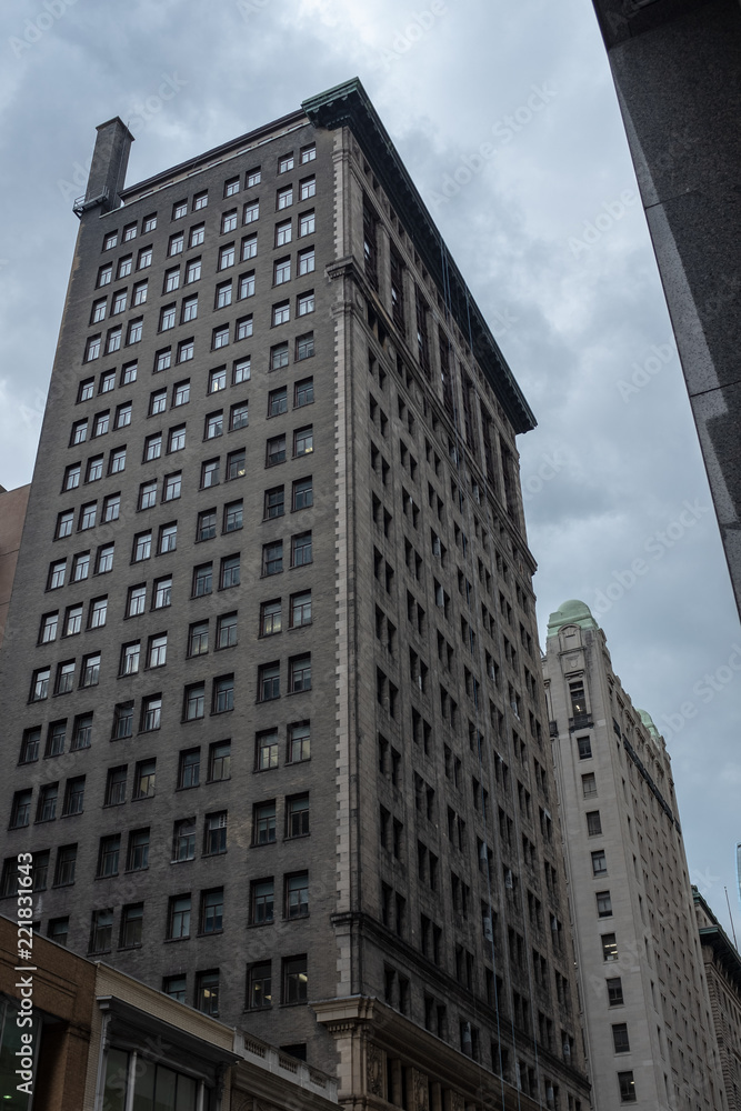 Naklejka premium Old brick build sky scraper