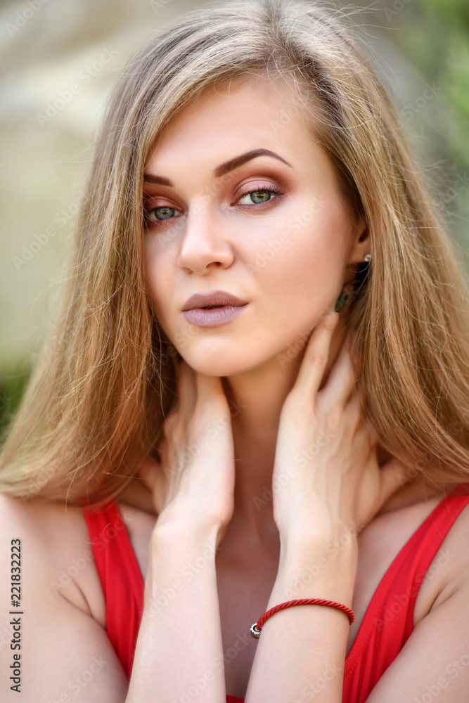 Portrait of beautiful young woman in red Portrait of beautiful young woman in red