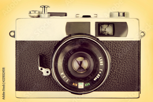 Retro camera, sepia colored image.