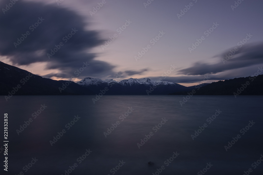 Scenic View Of Lake Against Snowcapped Andes Mountains