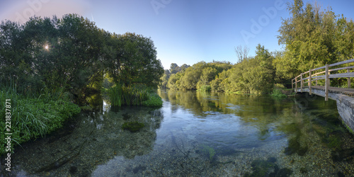 Autumn sunrise on the River Itchen - a famous chalk bed stream renowned for fly fishing - between Ovington and Itchen Abbas in Hampshire, UK. photo