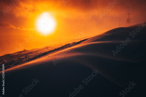 Winter landscape with snowy pine trees and stunning sunset,Carpathians