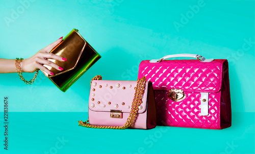 Wallpaper Mural Group of beautiful purses bags and woman hand holding one handbag.  Shopping image. Torontodigital.ca
