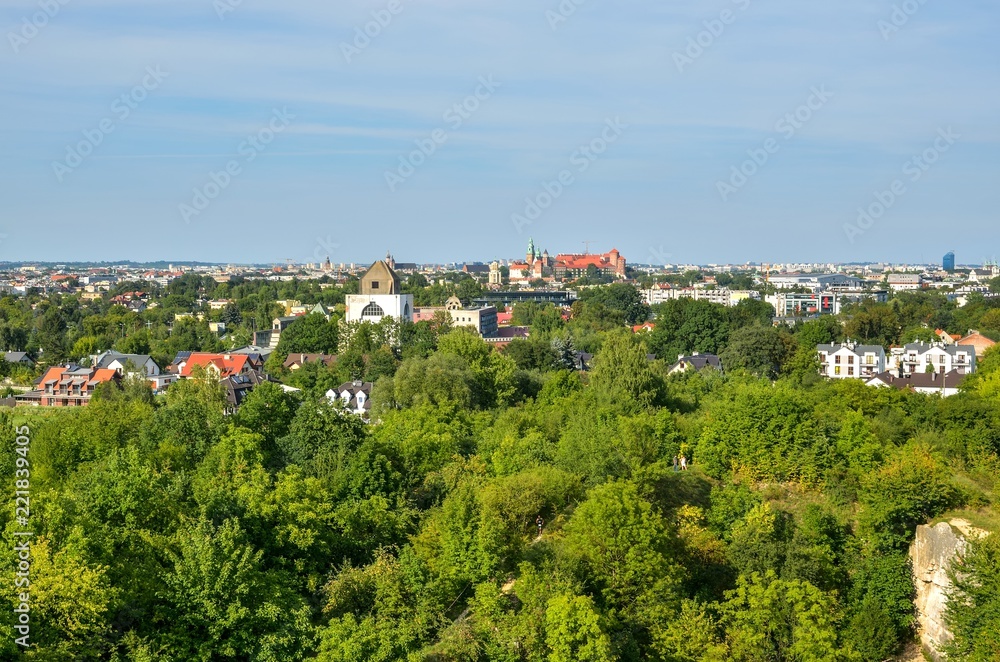 Fototapeta premium Beautiful urban landscape. View of the city of Krakow from the Zakrzowek quarry.