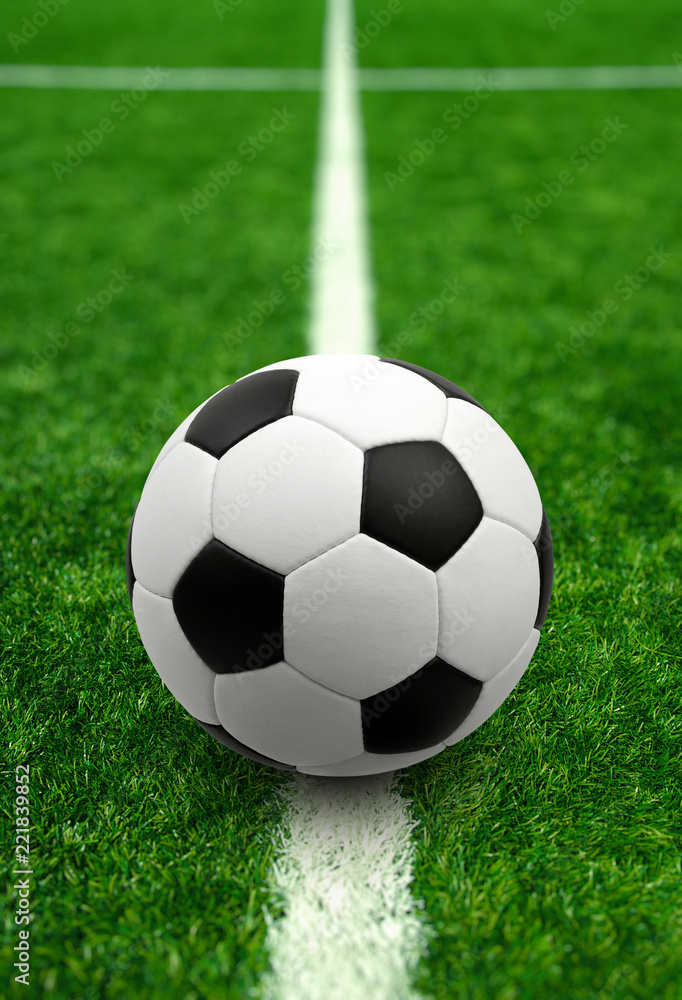Soccer ball on the field - obrazy, fototapety, plakaty 