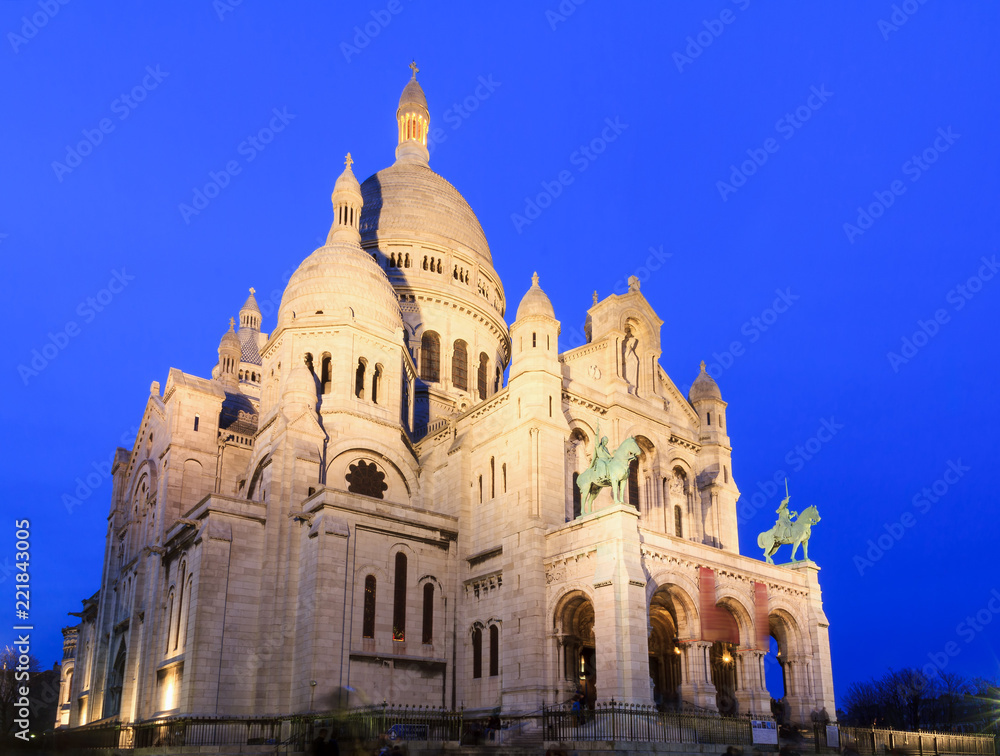 Beautiful view of the Basilica Sacre-Coeur in Paris, France, at the blue hour

