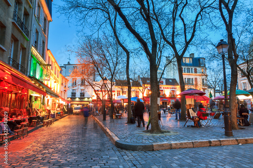 Beautiful evening view of the Place du Tertre and the Sacre-Coeur in Paris, France

