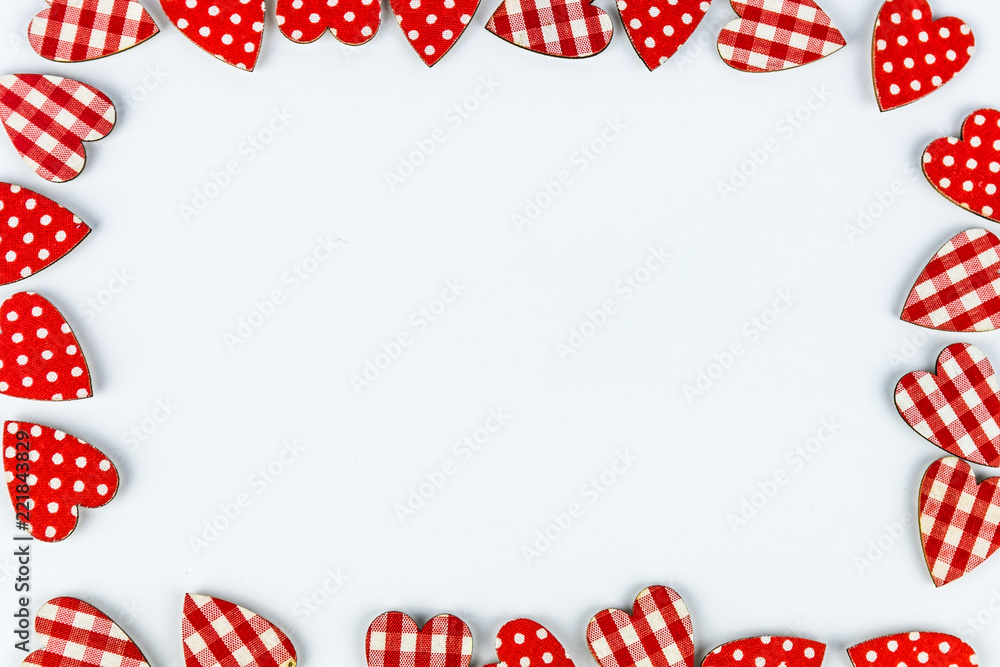 Obraz premium frame with hearts isolated on white