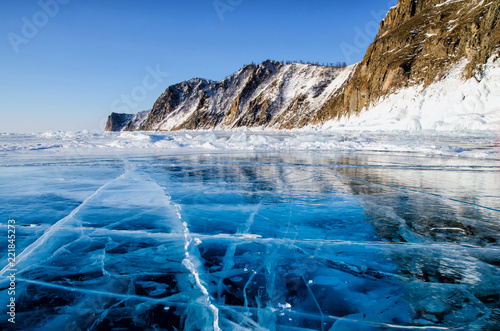 View of beautiful drawings on ice from cracks and bubbles of deep gas on surface of Baikal lake in winter  Russia