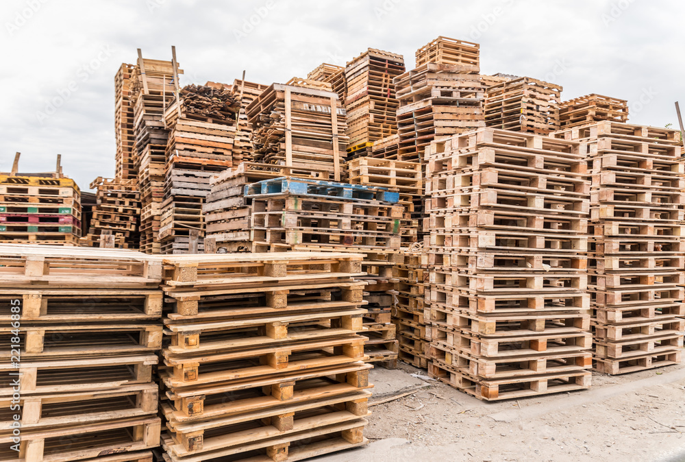 The old wooden pallets stack at the yard 
