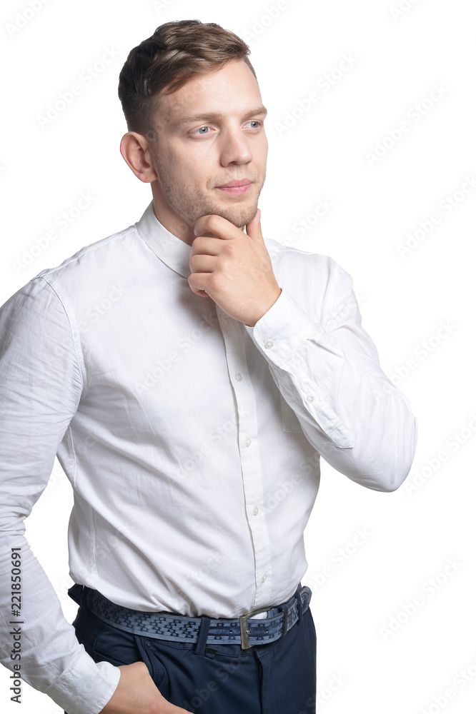 Handsome smiling young man on white background Handsome smiling young man on white background