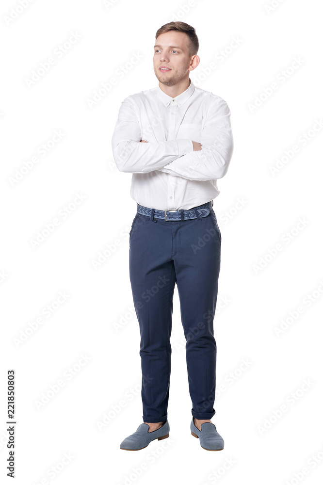 Handsome smiling young man on white background