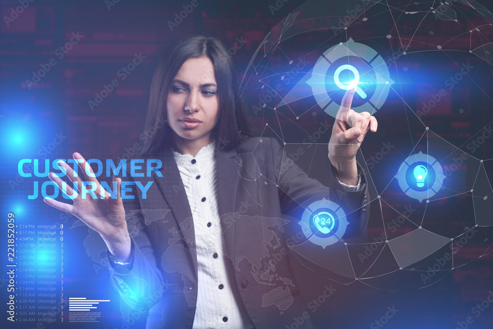 The concept of business, technology, the Internet and the network. A young entrepreneur working on a virtual screen of the future and sees the inscription: Customer journey The concept of business, technology, the Internet and the network. A young entrepreneur working on a virtual screen of the future and sees the inscription: Customer journey