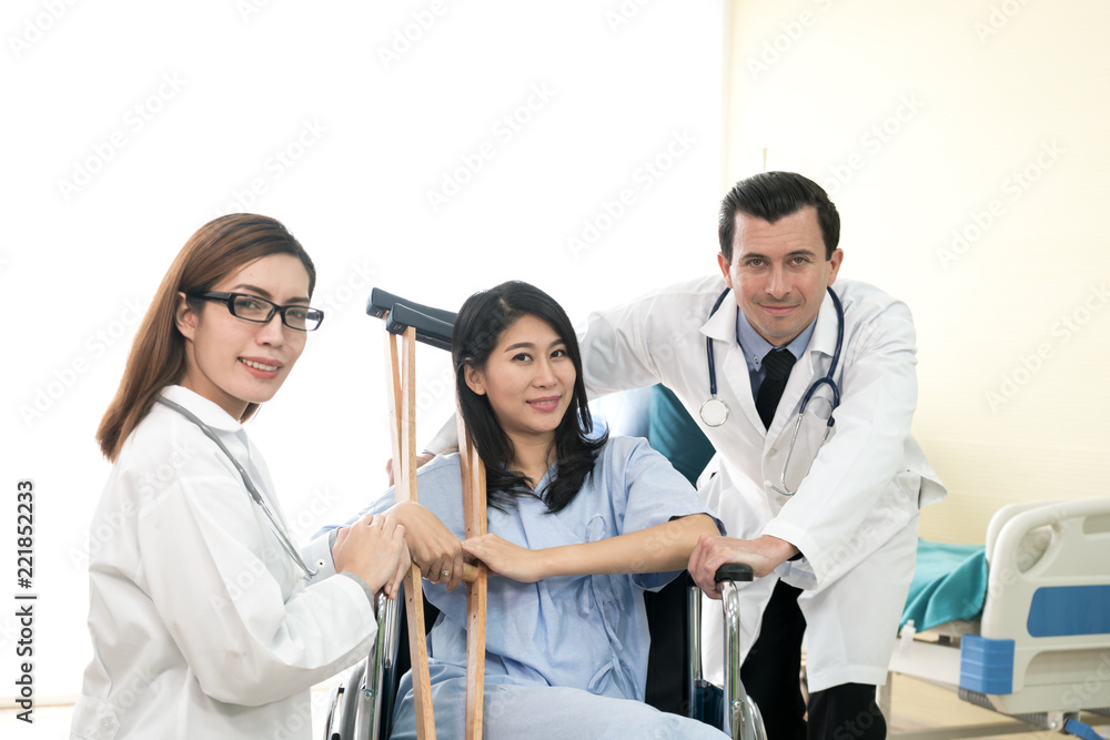 Doctor and patient on wheelchair Doctor and patient on wheelchair