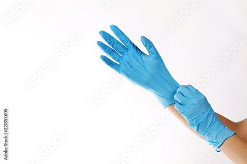 Human wearing glove on white background. photo