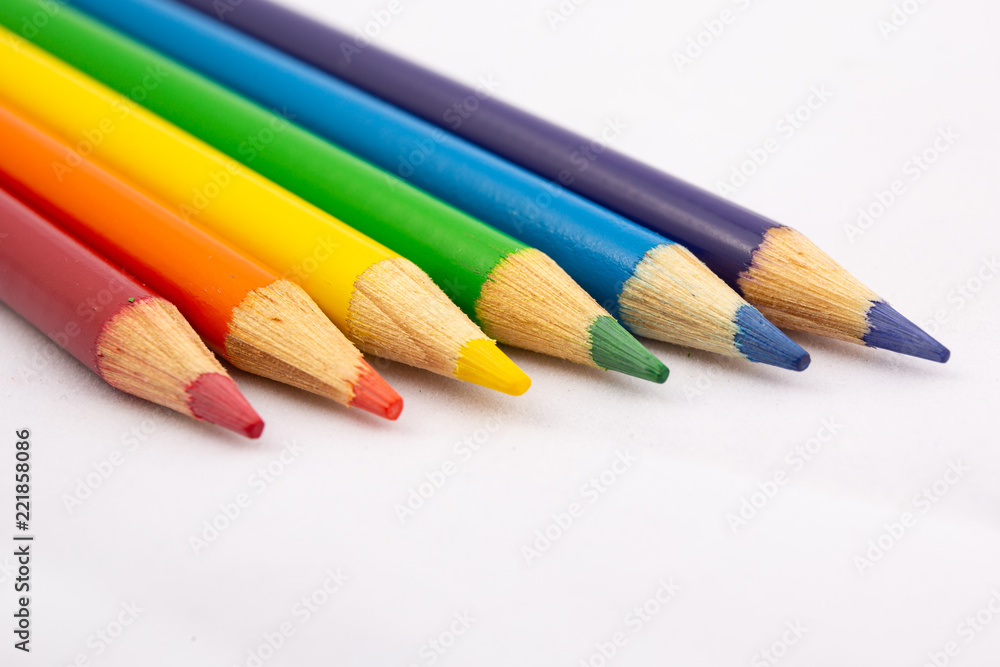 Rainbow colored pencils on an angle Rainbow colored pencils on an angle