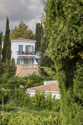luxury mediterranean villa with balconys in a mediterranean landscape