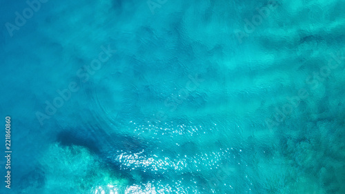 Aerial view at the sea. Turquoise water from air as a background from air. Natural seascape at the summer time. Seascape from drone