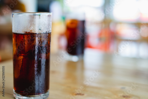 Soft drink on wooden table ...