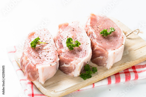 Pork meat steak on white.