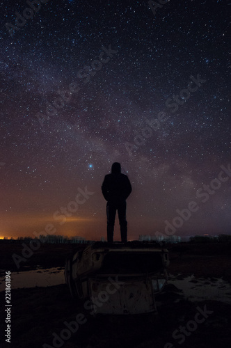 Man on the background of the milky way