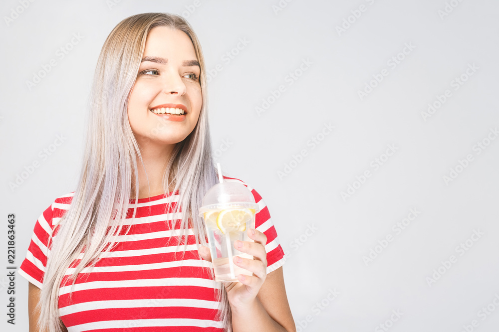 Face portrait of woman drinking water. Smiling girl. Isolated portrait. Face portrait of woman drinking water. Smiling girl. Isolated portrait.