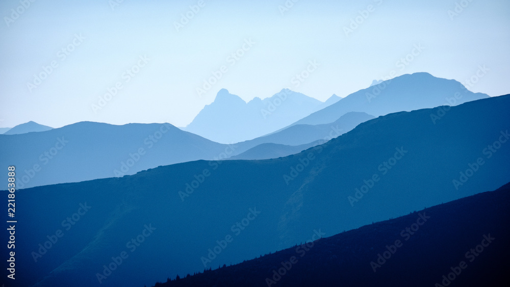 mountain top panorama in autumn covered in mist or clouds mountain top panorama in autumn covered in mist or clouds