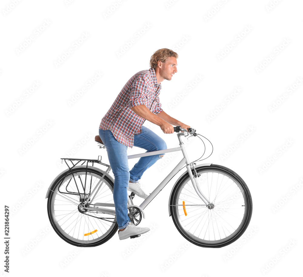 Handsome young man riding bicycle on white background Handsome young man riding bicycle on white background