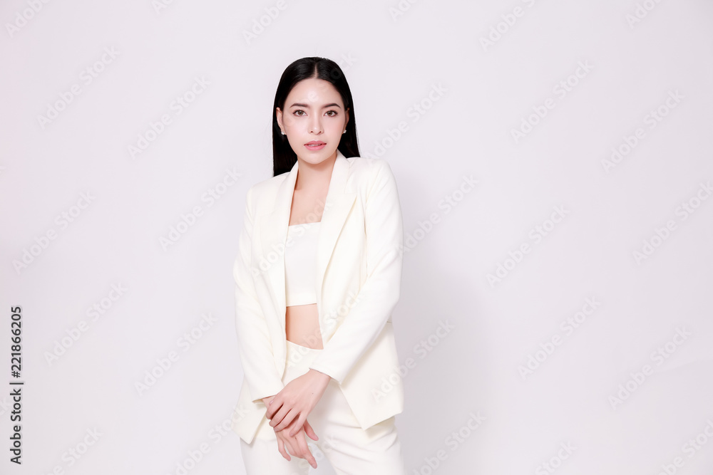 Elegant and modern Asian confident business woman in style isolated over white background.