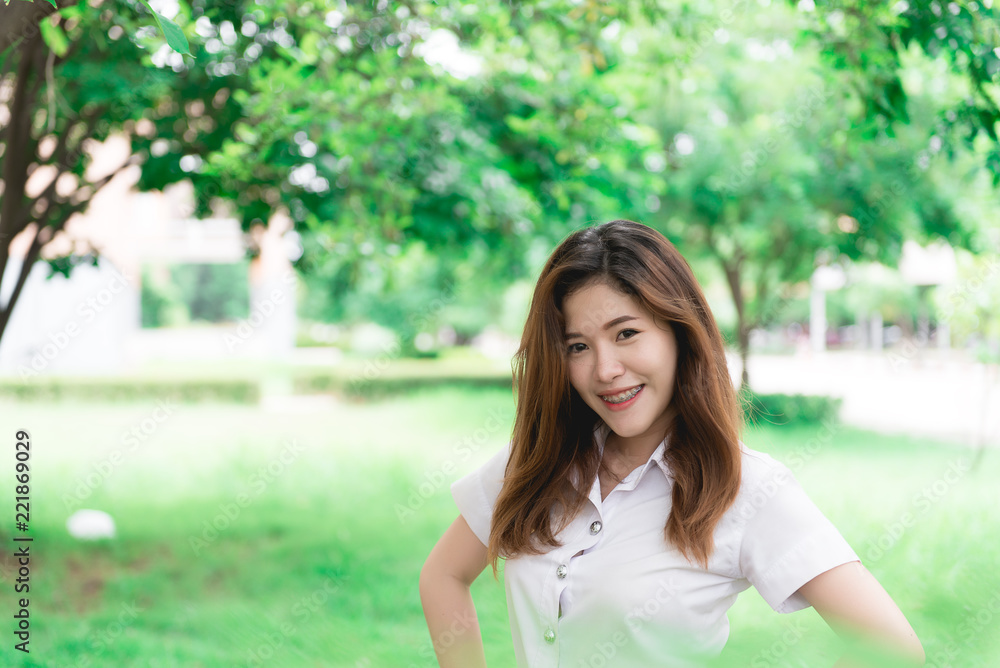 Portrait of Beautiful thai student,Cute asian girl outdoors,thailand people,Hobbie of modern student,lifestyle of single woman Portrait of Beautiful thai student,Cute asian girl outdoors,thailand people,Hobbie of modern student,lifestyle of single woman