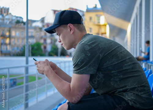 Young man checking his phone