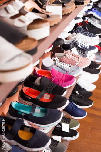 Comfortable footwear are standing in boutique