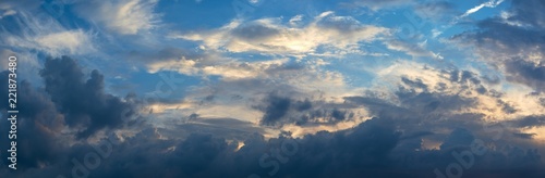 White and dark clouds in the blue sky