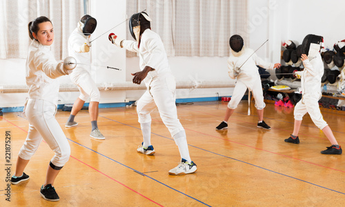 Woman training fencing movements